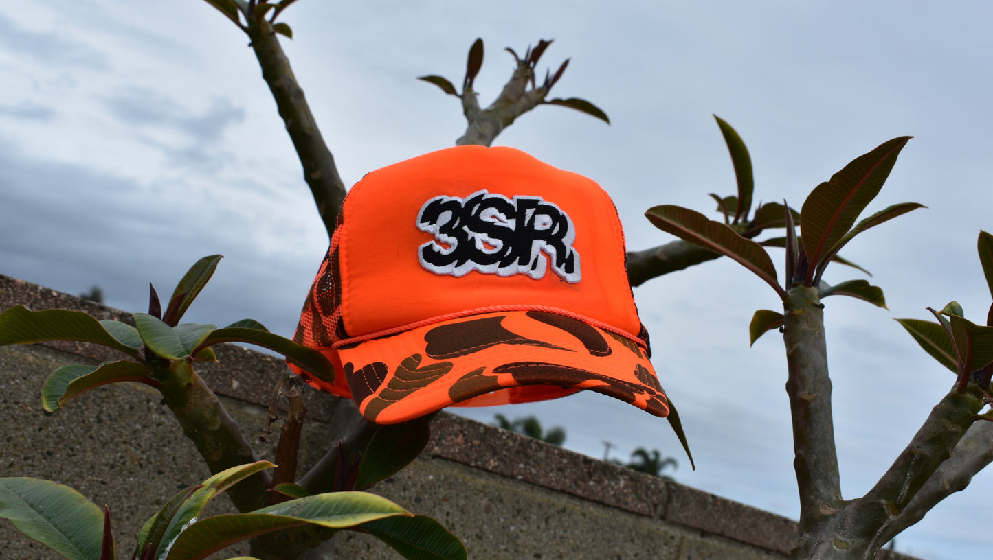 ORANGE CAMO TRUCKER